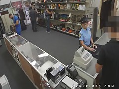Real cop moonlights as ho for pawn shop